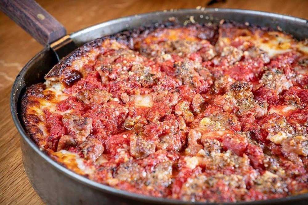 sausage deep dish pizza from Labriola in Chicago, IL