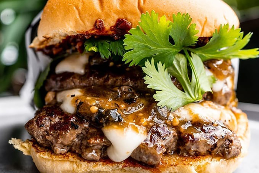 close-up of a juicy burger featured in our Best Burgers in Washington DC list