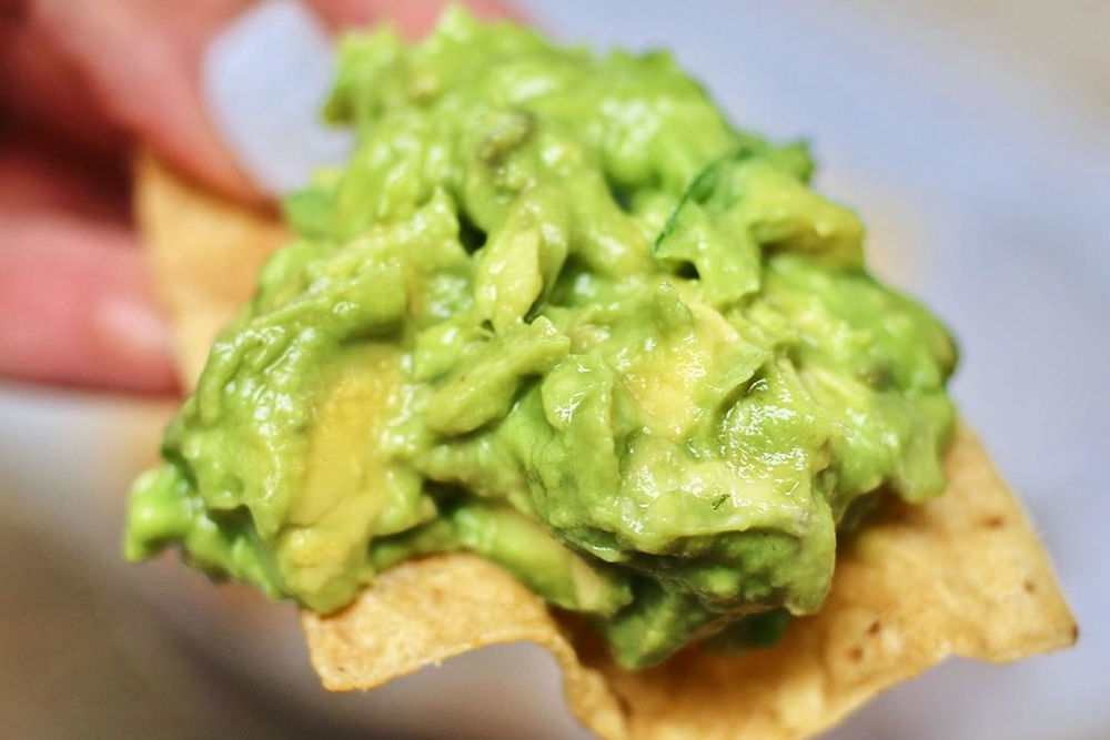 tasty guacamole dish from Mi Cocina, a favorite on our Mexican Restaurants in Dallas list