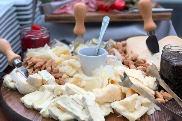 a cheeseboard on a table at J.G. Skyhigh, on our list of Rooftop Restaurants in Philly