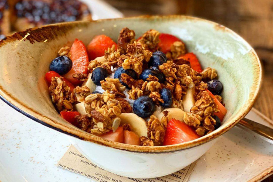 yogurt parfait topped with granola, fresh blueberries, and strawberries from first watch in tampa