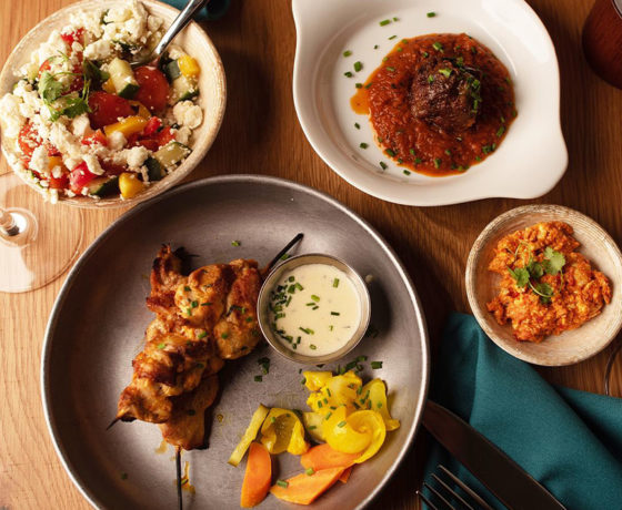 chicken skewers, meatball and sauce, and greek salad from ambar in DC