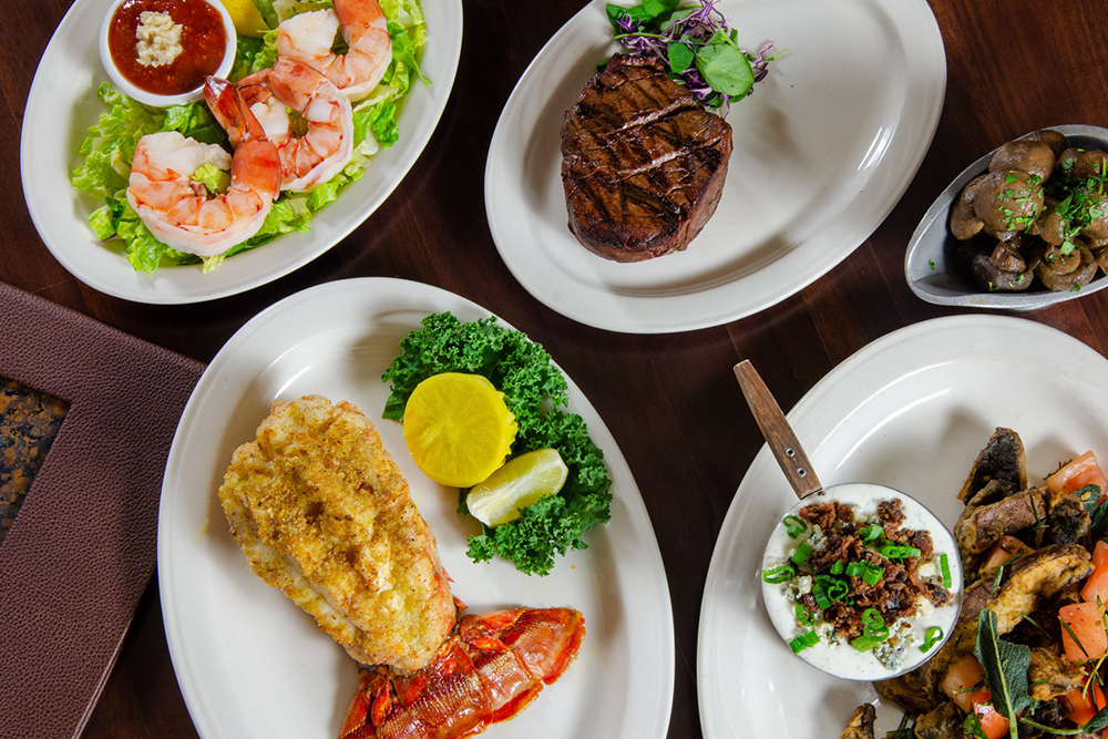 lobster, shrimp salad, steak, and other entrees from Charley's Steakhouse and Market Fresh Fish in tampa