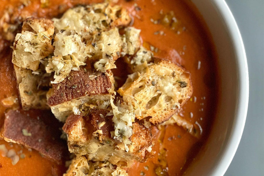 tomato soup topped with croutons from fainting goat in dc