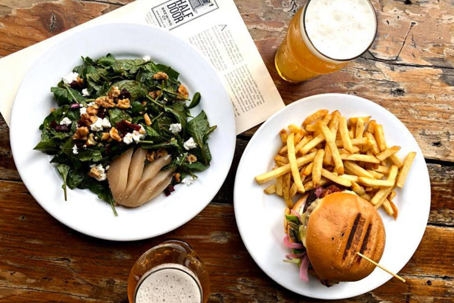 burger and fries with side salad from half door brewing co. in san diego