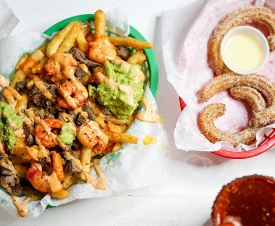 fully loaded fries and churros from the taco stand in la jolla