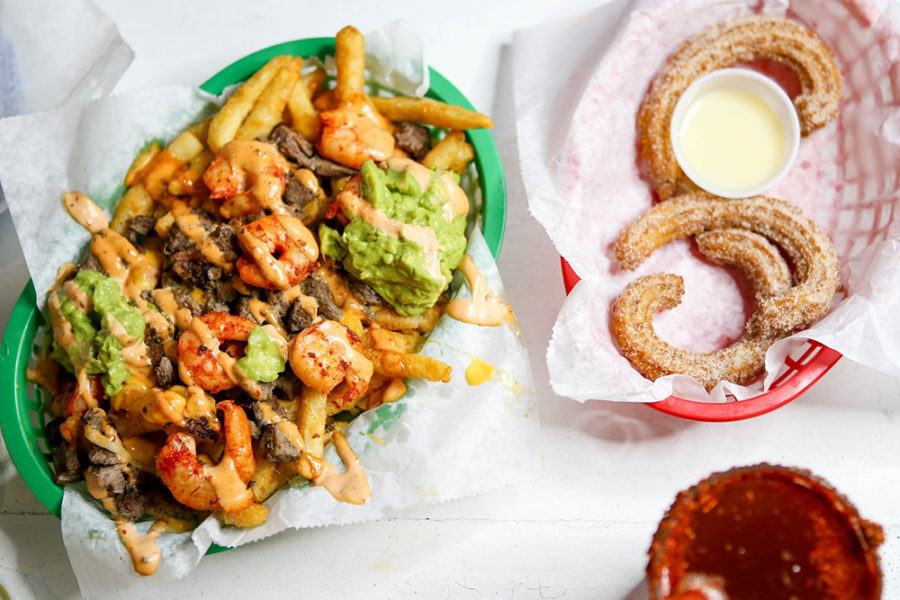 fully loaded fries and churros from the taco stand in la jolla