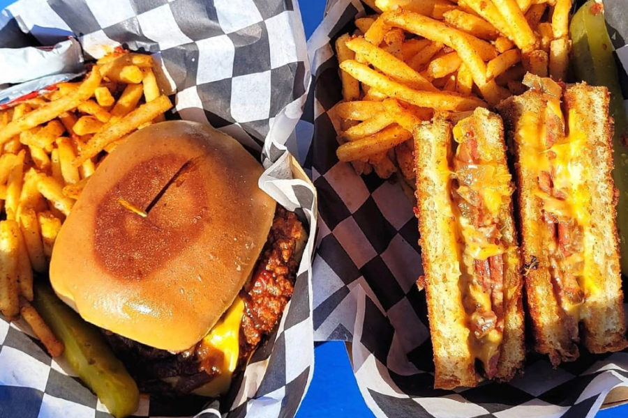 chicken sandwich and grilled cheese sandwich with sides of fries from thunderbird station in dallas