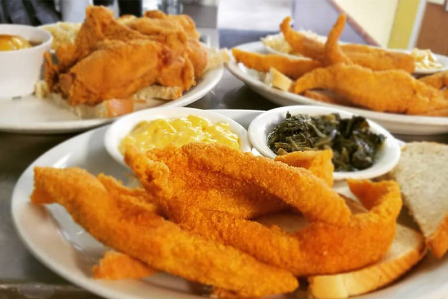 fried fish with sides of mac and cheese and collards from welton street cafe in denver