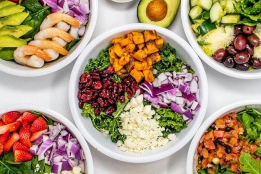 an assortment of salad bowls from fuel healthy kitchen in philly