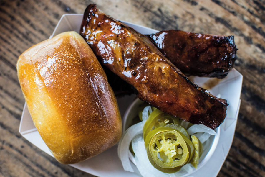 glistening bbq ribs and bread roll for sonny bryan's smokehouse