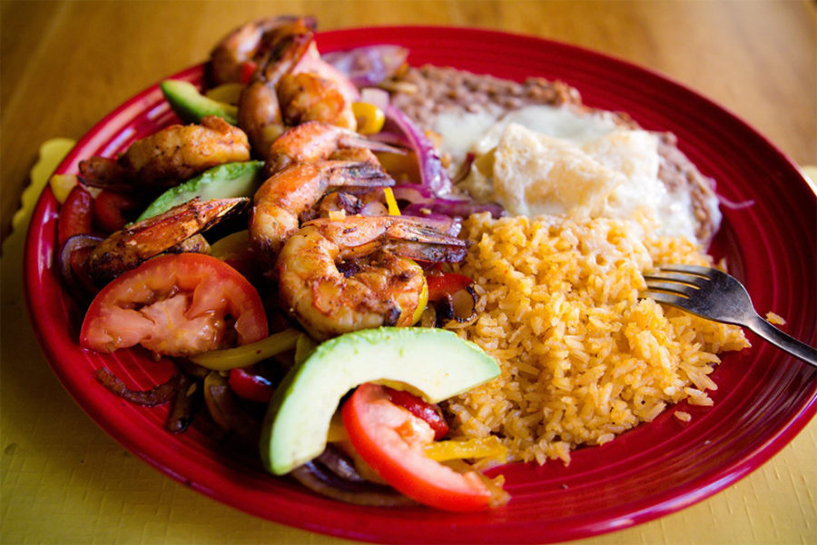grilled shrimp with sides of refried beans and rice from norte in carlsbad