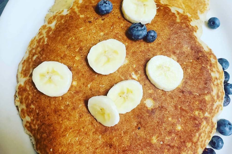 pancake topped with fresh banana slices and blueberries from nicki's omelette and grill in tampa