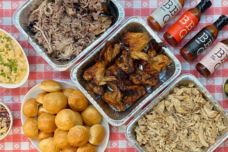 pulled pork, chicken wings, pulled chicken, and bread rolls from smoke daddy bbq in chicago