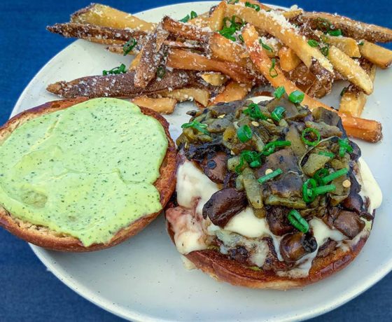 gourmet burger and side of parmesan fries from sel restaurant in scottsdale