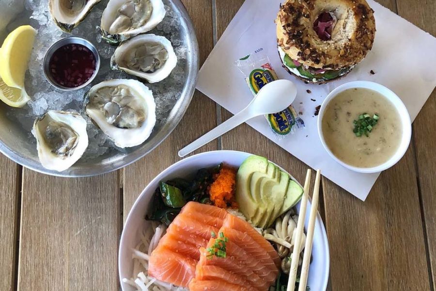 fresh oysters, salmon poke bowl, and cream cheese bagel from chula seafood in scottsdale