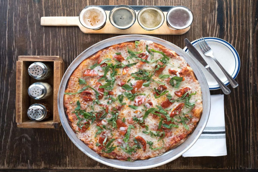pizza and beers from Eno's Pizza Tavern in dallas