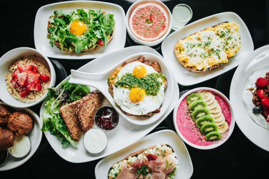 an assortment of brunch dishes from Hero in dallas