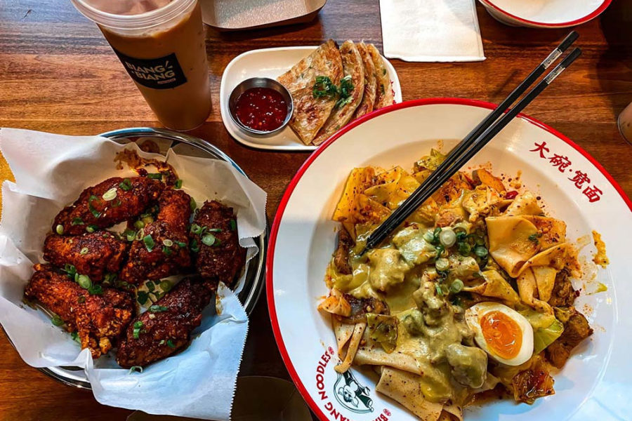 Chicken Curry Noodles, Green Onion Pancakes, Sichuan Honey Wings and Milk Tea from biang biang noodles in seattle