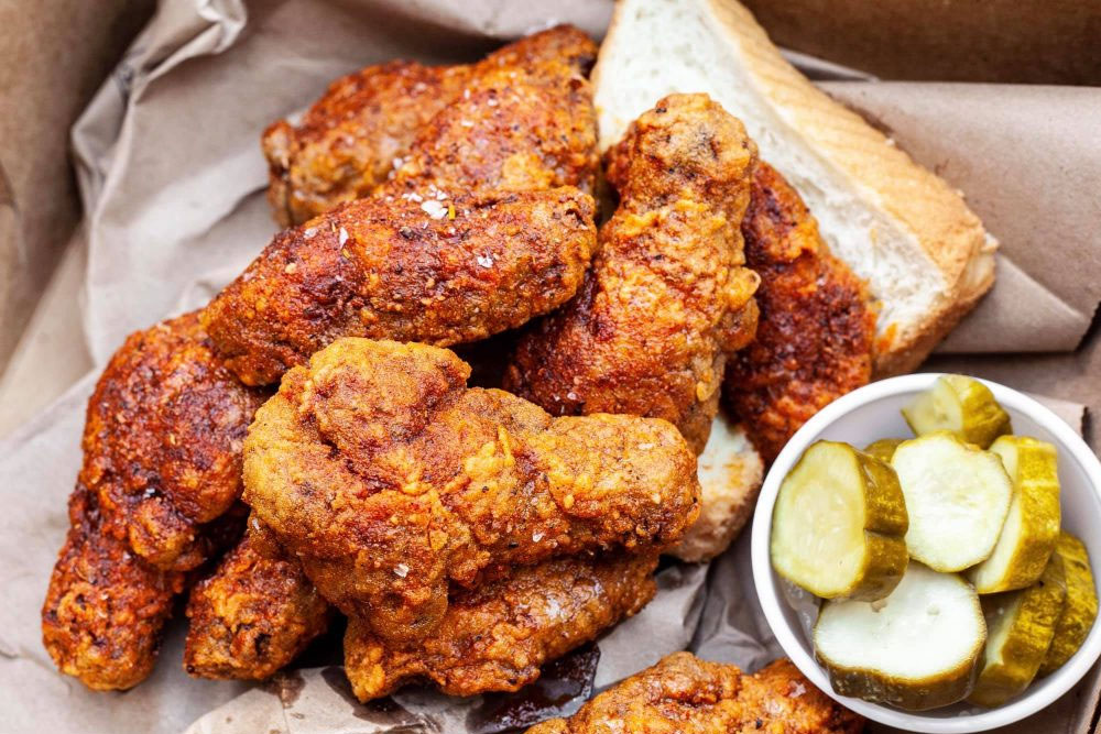 fried chicken, bread, and pickles from Horace's hot chicken in Charlotte, nc 
