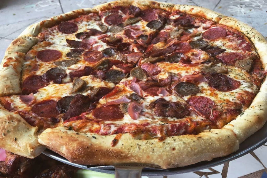 pizza with sausage, pepperoni, and ham from lees grocery in tampa