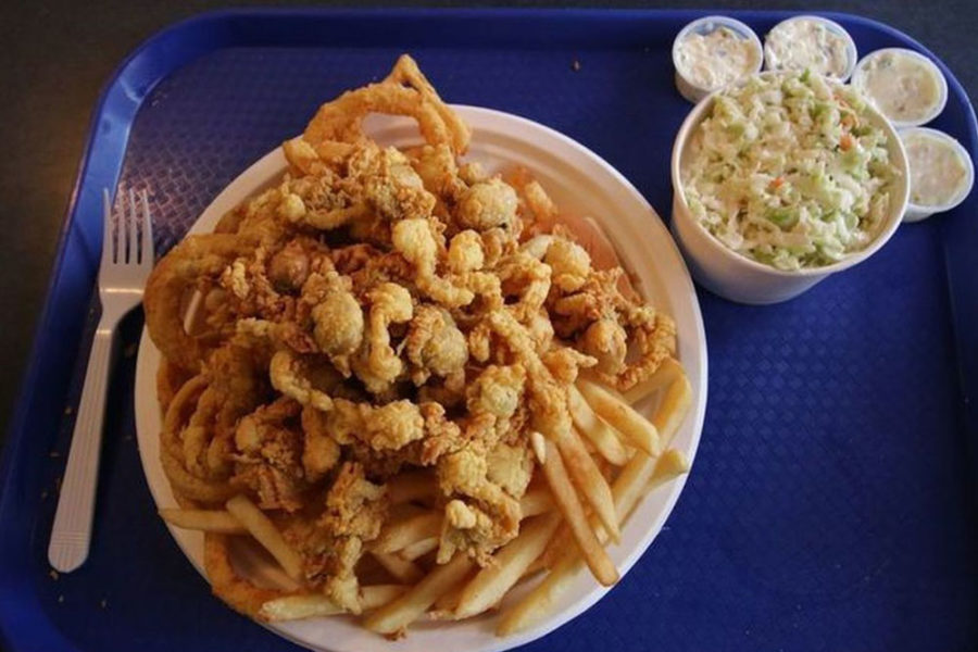 tray with fried clams, fries, and coleslaw from neptune oyster in boston