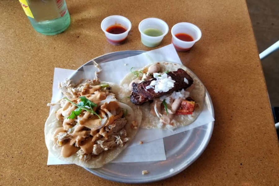 two flour tortilla tacos from resident taqueria in dallas
