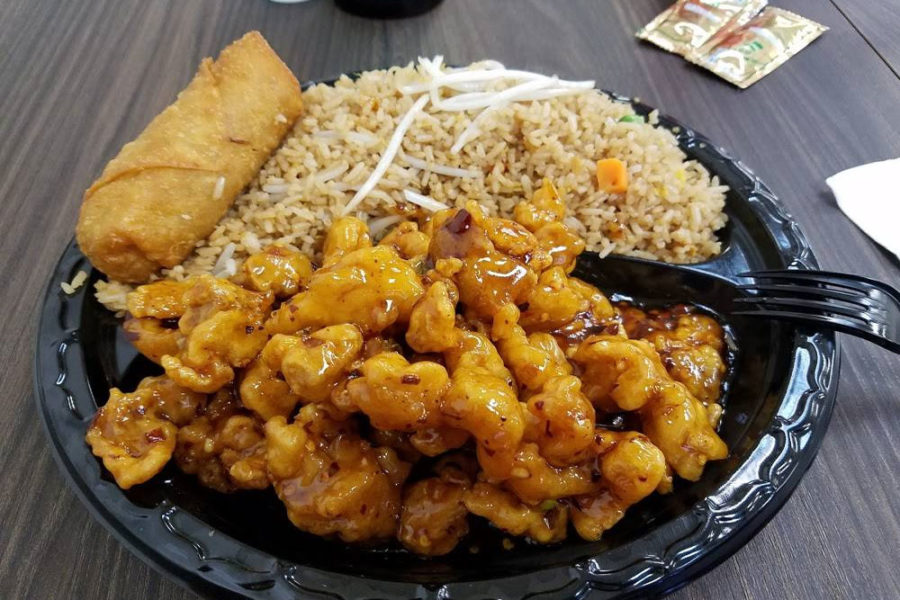 orange chicken, rice, and egg roll from yis chinese restaurant in pheonix