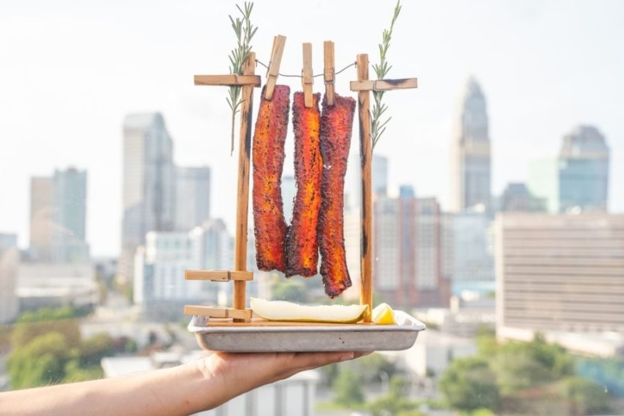 ribs with a view of the charlotte skyline at cloud bar by david burke