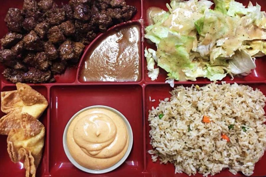 bento tray with rice, lettuce, meat, and crab rangoon from ichiban in tuscaloosa