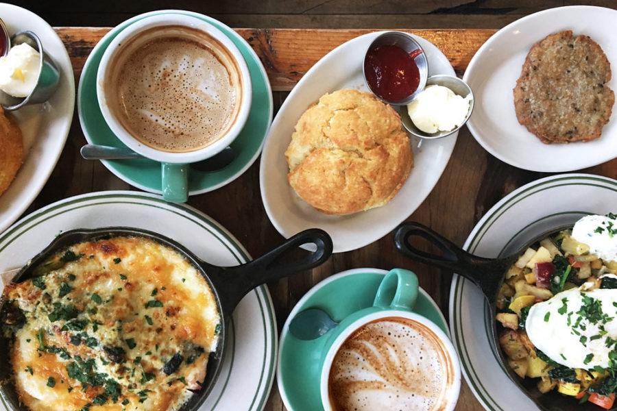baked mac and cheese, two coffees, a biscuit, sausage, and potato salad from oddfellows cafe and bar in seattle