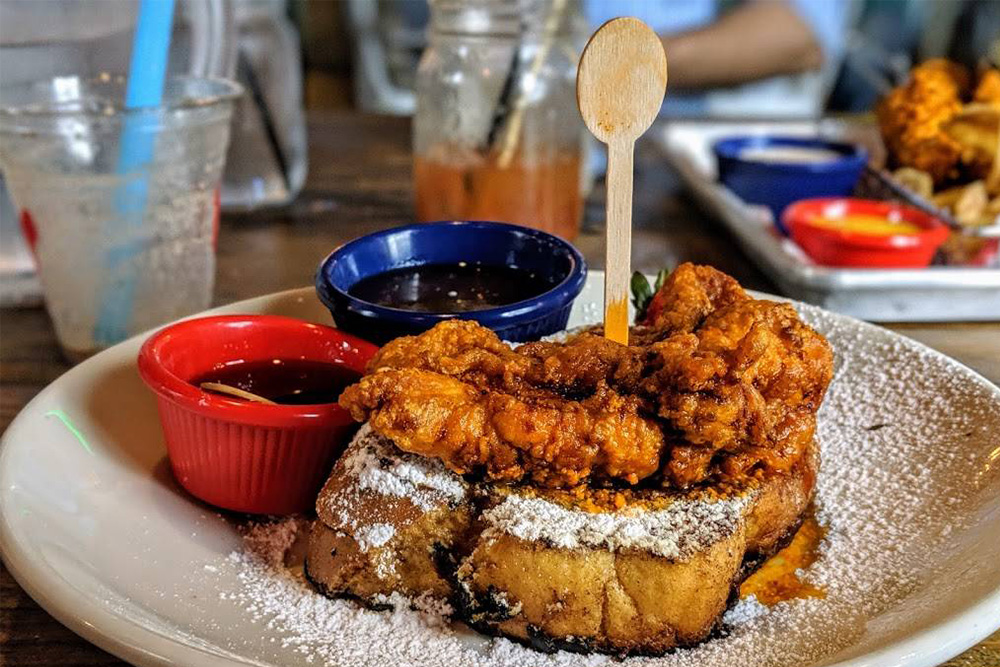 french toast topped with fried chicken from Party Fowl in Nashville