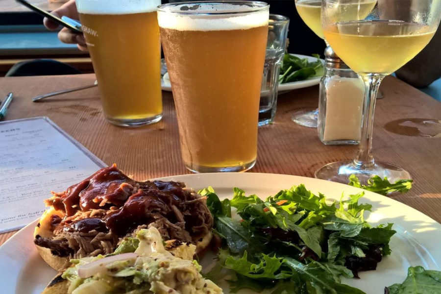 pulled pork sandwich with side salad, beer, and wine from right proper brewing company in DC