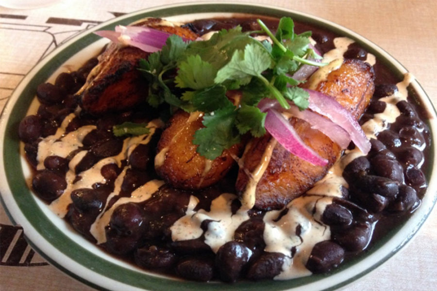 bowl with black beans topped with fried plaintains and onion from up down nashville