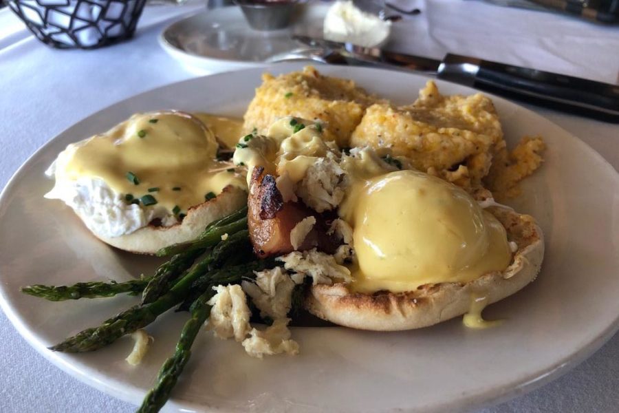 egg benedict with sides of cheesy grits and asparagus from urban grub in nashville