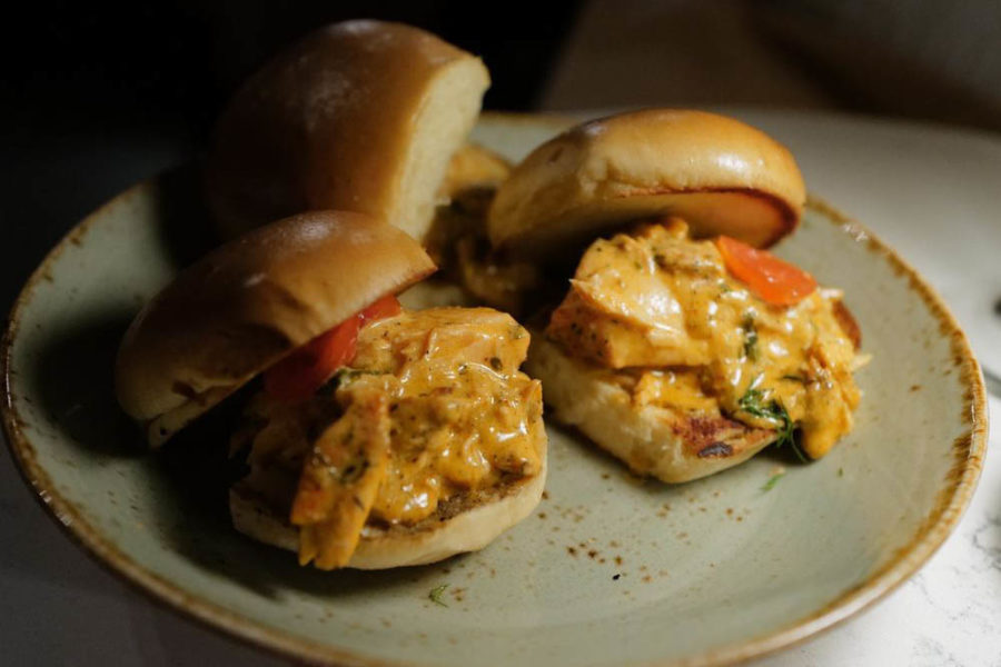 sliders with chicken, cheese sauce and, tomato from EG & MG in nashville