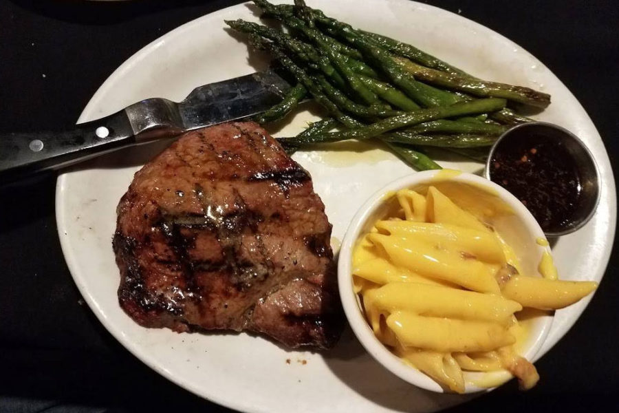 steak, asparagus, and side of mac and cheese from hangar one steak house near Wichita Dwight D. Eisenhower National Airport in Wichita, KS