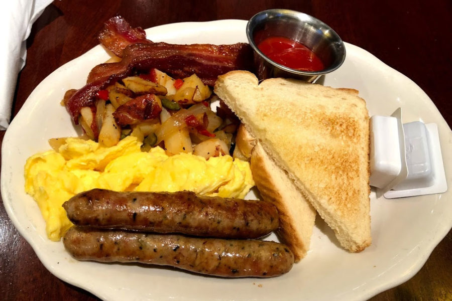 eggs, sausage links, toast, bacon, and hashbrowns from pappadeaux seafood bar at Dallas Fort Worth International Airport