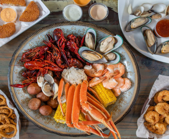 seafood boil with crawfish, oysters, shrimp, lobster, and calamari from phillip's seafood at atlanta international airport