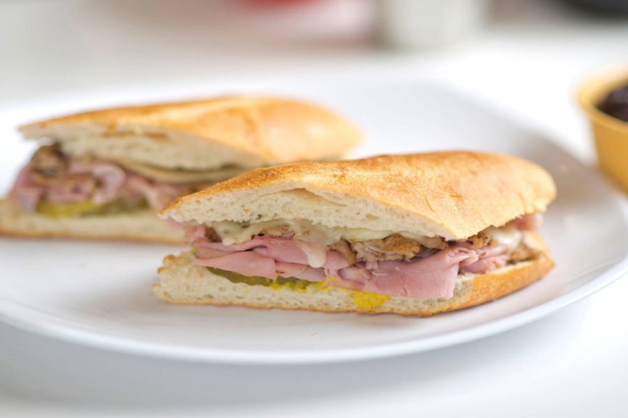 cuban sandwich with ham, cheese, picks, and chicken from zaza cuban cafe at orlando international airport