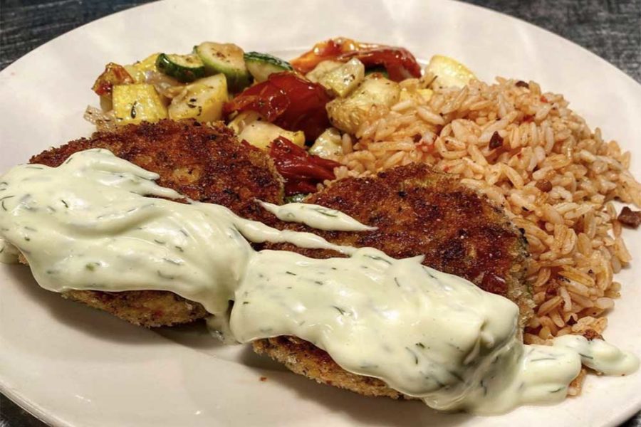 crab cakes, rice, and sauteed zucchini from blue marlin in columbia, south carolina