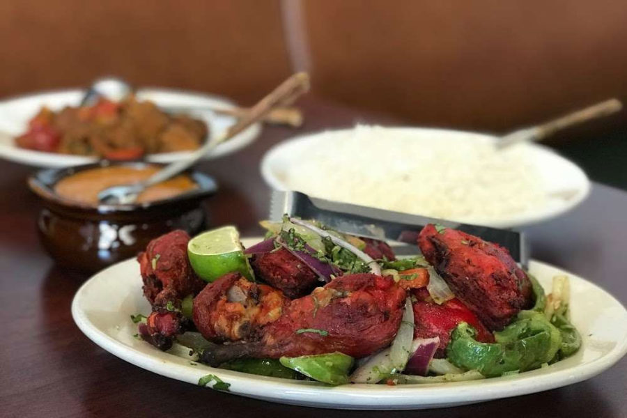 chicken wings with vegetables and rice from coriander flavors of India restaurant in Denver