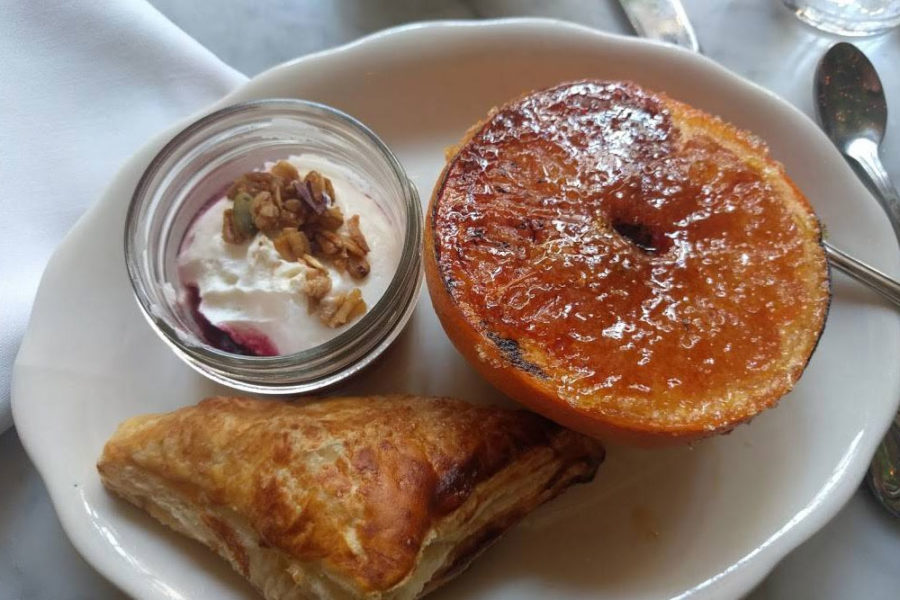 croissant pastry, boiled grapefruit, and a small side of yogurt from harp and crown in philadelphia