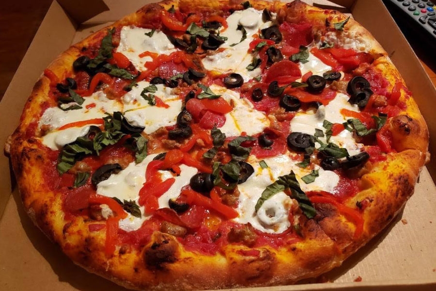 margherita pizza with olives and red peppers from mario's italian ristorante in charleston