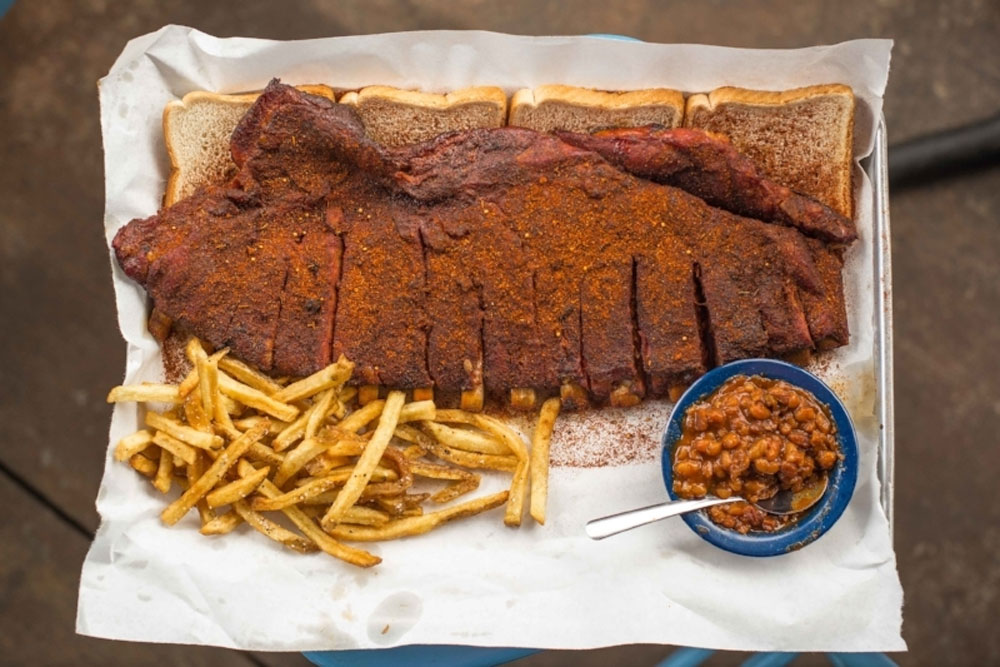 barbecue ribs with sides of fries and baked beans from Martin's Bar-B-Que Joint in Nashville