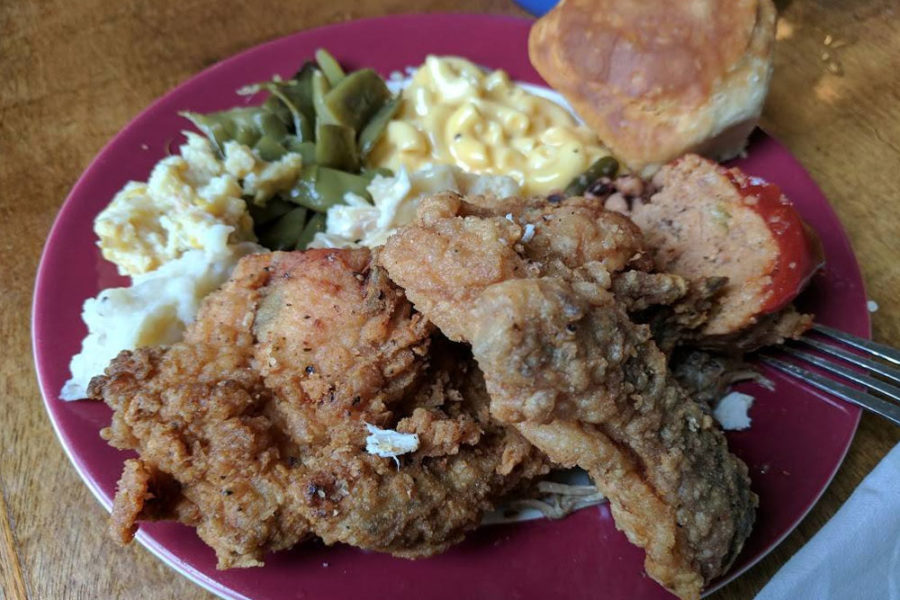 fried chicken, mashed potatoes, collards, mac and cheese, and a biscuit from monell's in nashville