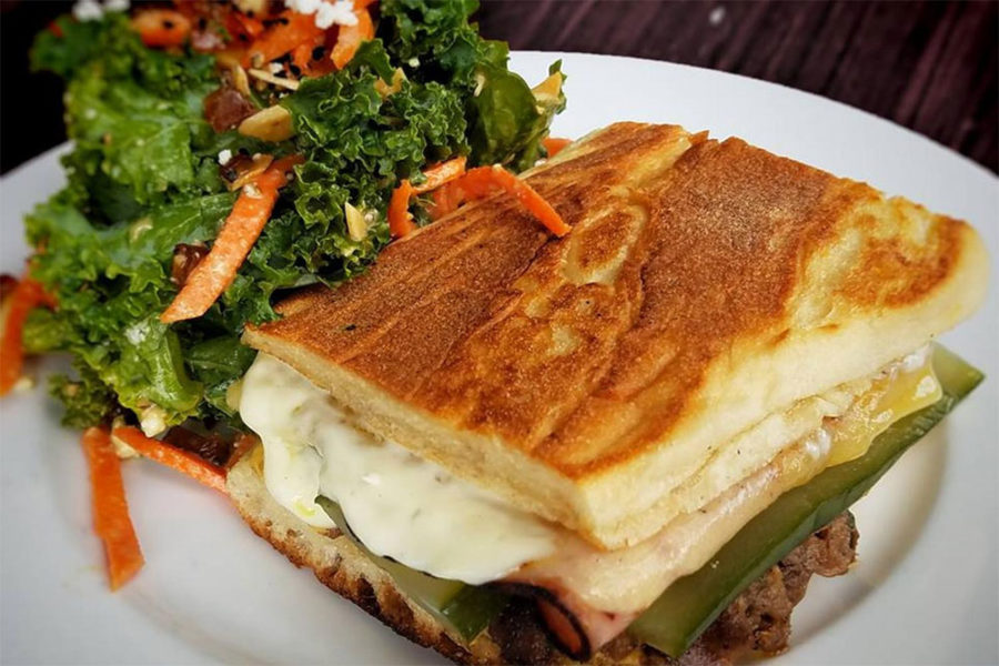 panini sandwich and a side of kale salad from nue in seattle