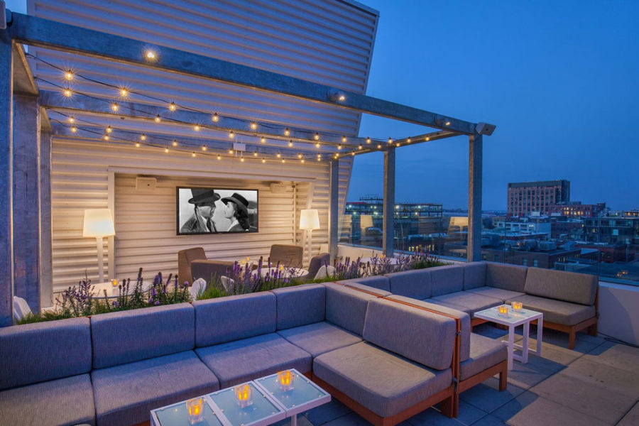 outdoor lounge area at the rooftop at revere in boston