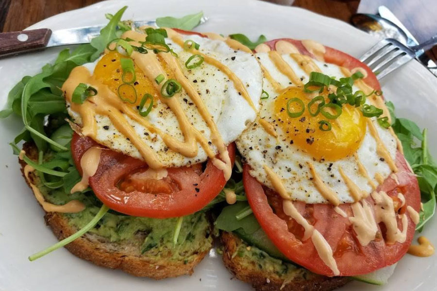 avocado toast with tomato and egg from the vig in chicago