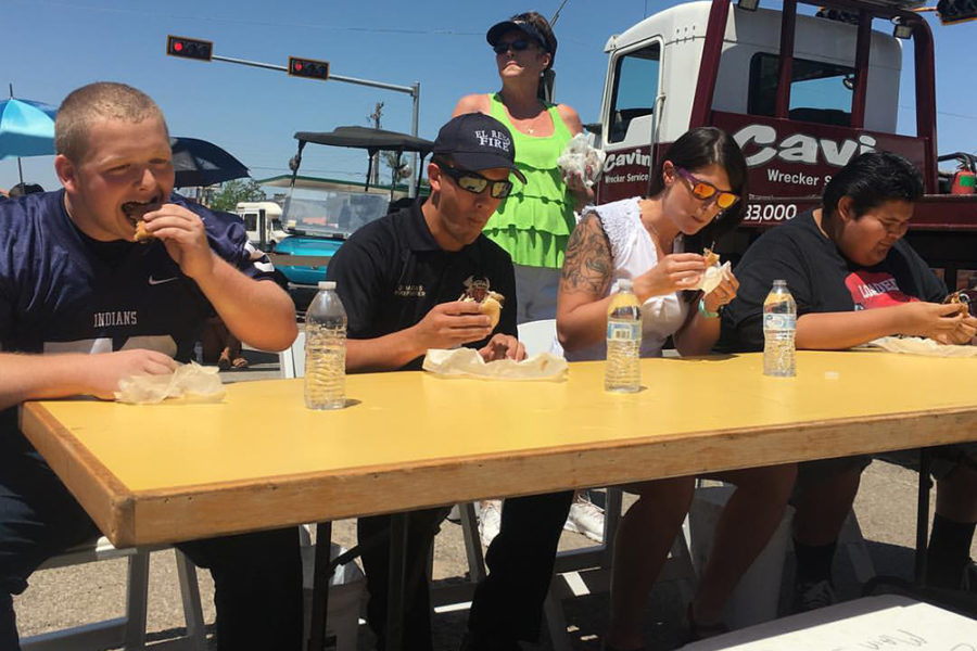 A competitive eating competition from the El Reno Burger Day Festival in Oklahoma City, OK